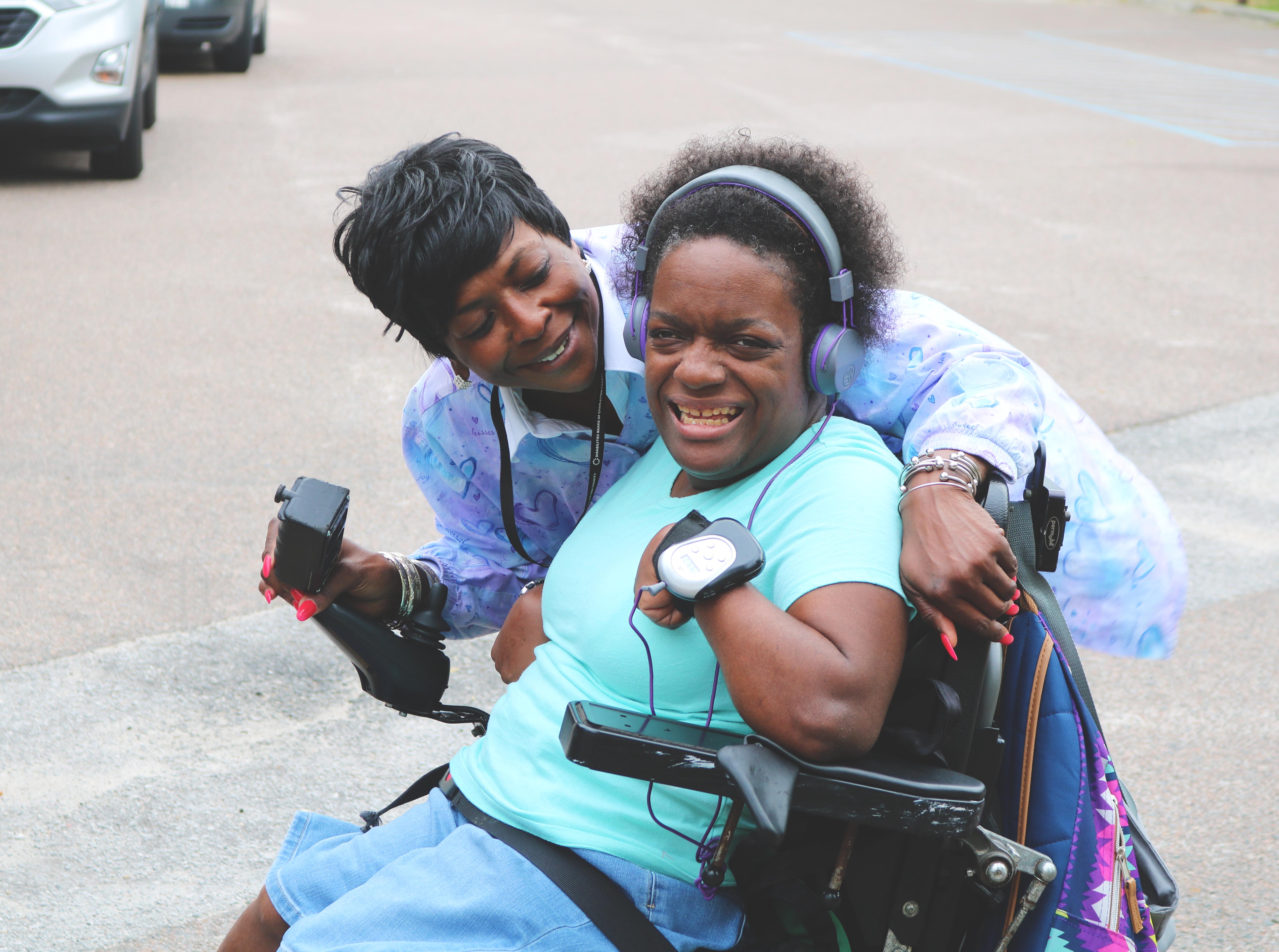 disabilities board people smiling together